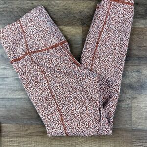 Athleta Orange And White Cheeta Print‎ Salutation Stash Textured Tights XS